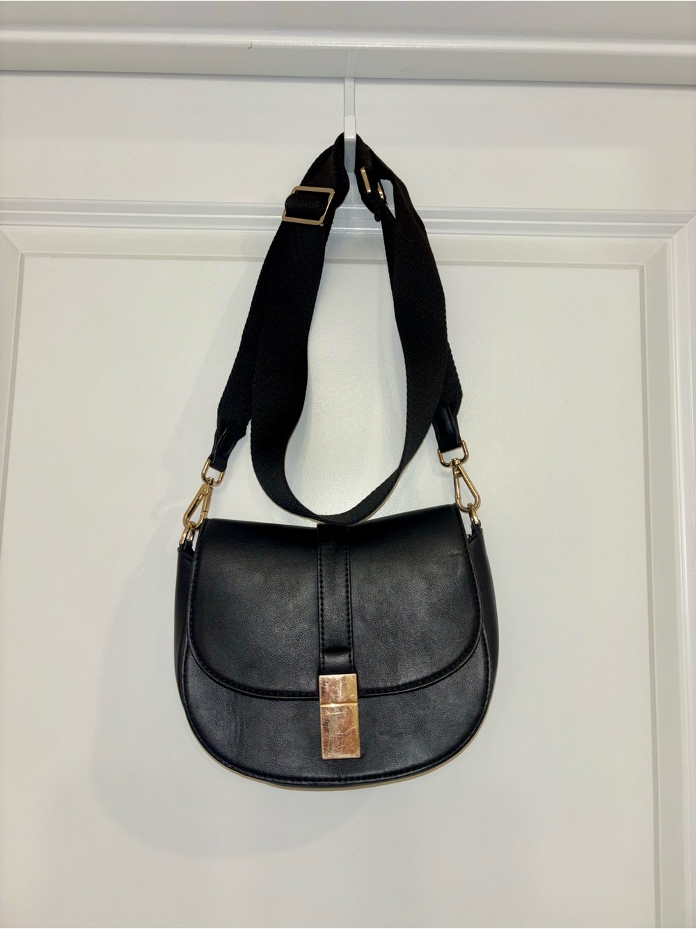 a new day Black Crossbody Saddle Bag with Gold Accent